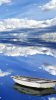 sky_clouds_reflection_boat_86205_1080x1920.jpg