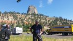 John in front of Devils Tower pull over.jpg